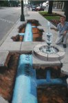 Water infrastructure as sidewalk art