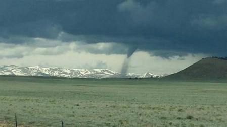 Taken just east/north of Hartsel around 11am June 8, 2014 by Laura Rhodes.  Snow capped mountains and tornado -- Brian Bledsoe
