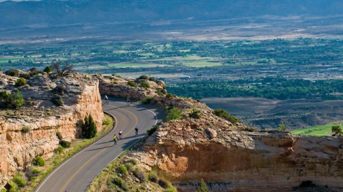 Bicycling the Colorado National Monument, Grand Valley in the distance via Colorado.com