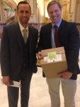 CWCB director James Eklund with manager in Water Supply Planning, Jacob Bornstein bring a box containing the draft water plan to the Capitol.