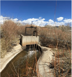 San Pedro Acequia. The headgate of the second oldest acequia in Colorado. Photo by Devon G. Peña