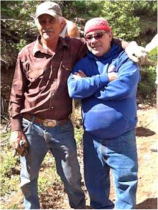 Delmer Vialpando and Devon G. Peña on La Sierra common lands, the 80,000-acre restored land grant of the Culebra acequia farmers. Photo by The Acequia Institute
