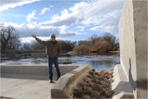 Scott Hummer, general manager of North Poudre Irrigation Company, talks about how his agency worked with Fort Collins Natural Areas and Colorado Parks and Wildlife to include a fish passage when the irrigation company replaced a diversion structure on the Poudre River that was destroyed by the 2013 floods. Work was completed [in February 2016]. (Pamela Johnson / Loveland Reporter-Herald)