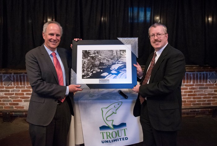 Denver Water CEO Jim Lochhead, left, receives award from CTU executive director David Nickum
