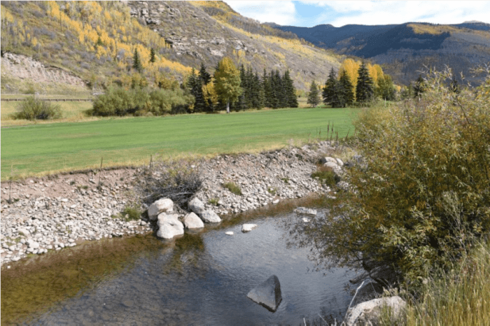 The creek long ago was put into a channel to accommodate the golf course, highways and roads. Photo Jack Affleck via The Mountain Town News. 