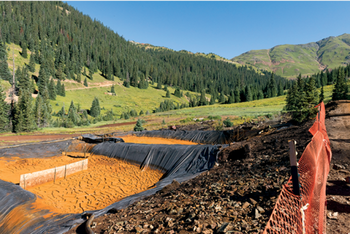 Diverting mine drainage into settling ponds allows iron oxides, heavy metals and other suspended particles to precipitate. Credit: EPA.