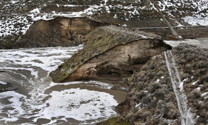 Twentyone Mile Dam near Montello , Nevada broke in February 2017 and caused flooding to the Union Pacific Railroad line near Lucin, Nevada and flooded the town of Montello. Photo credit Deseret News.