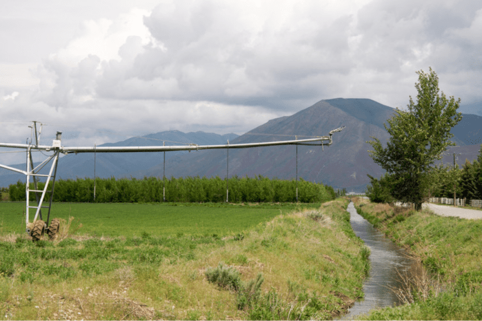Irrigation ditch and sprinkler, Silver Creek, Idaho.  Sam Beebe/Flickr, CC BY